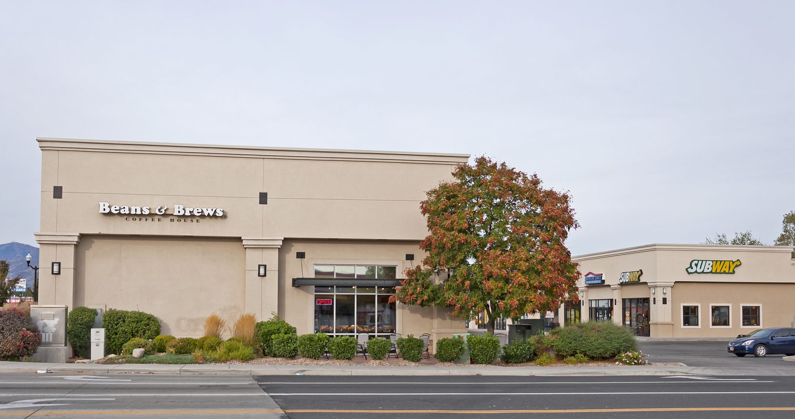 A building with a tree in front of it