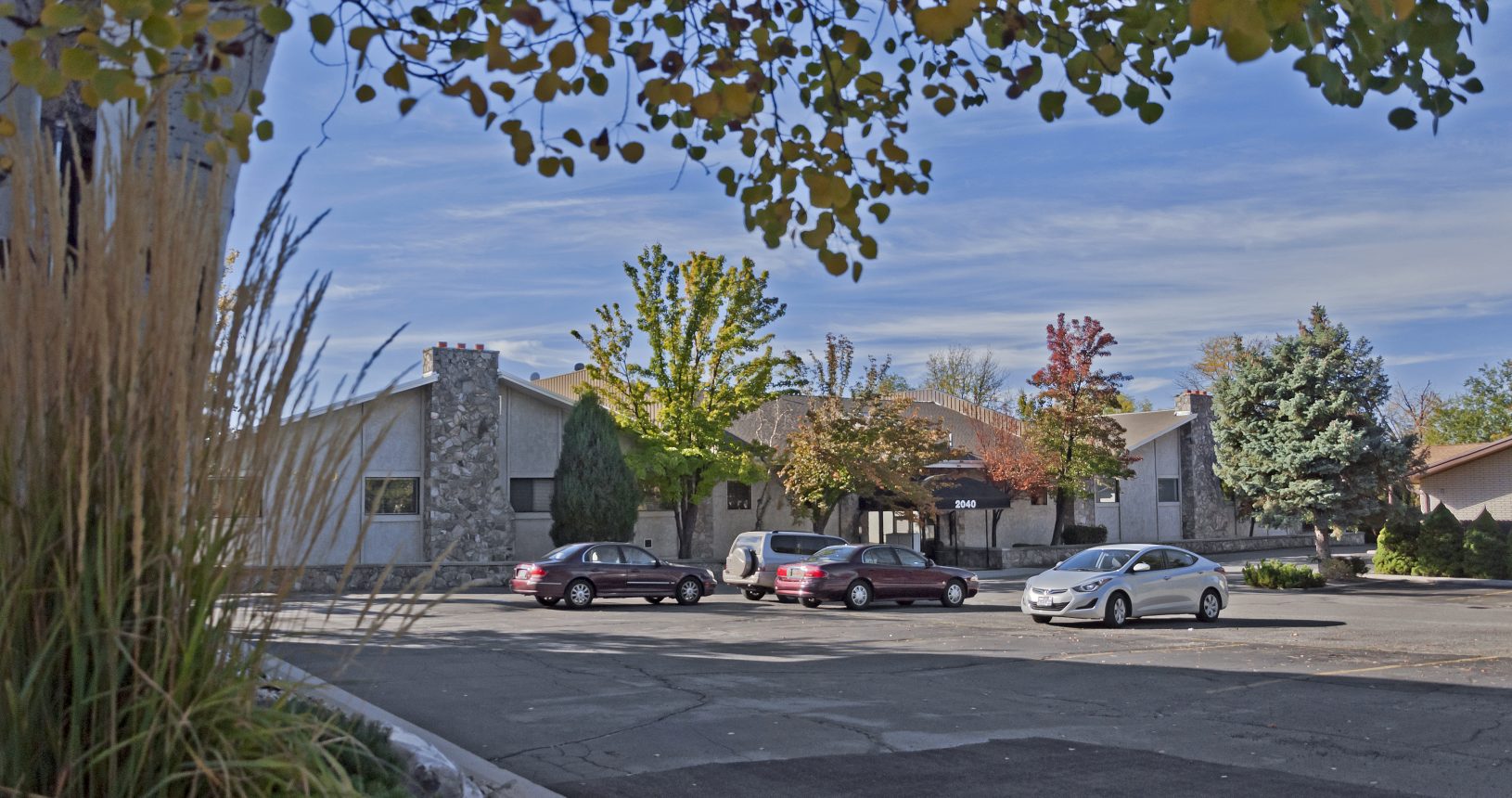 A parking lot with cars parked in it.