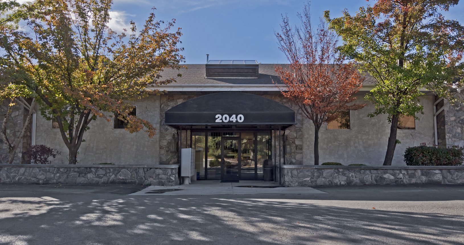 A building with trees in front of it