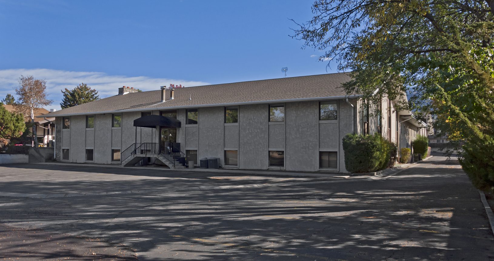 A large building with an umbrella in the middle of it.