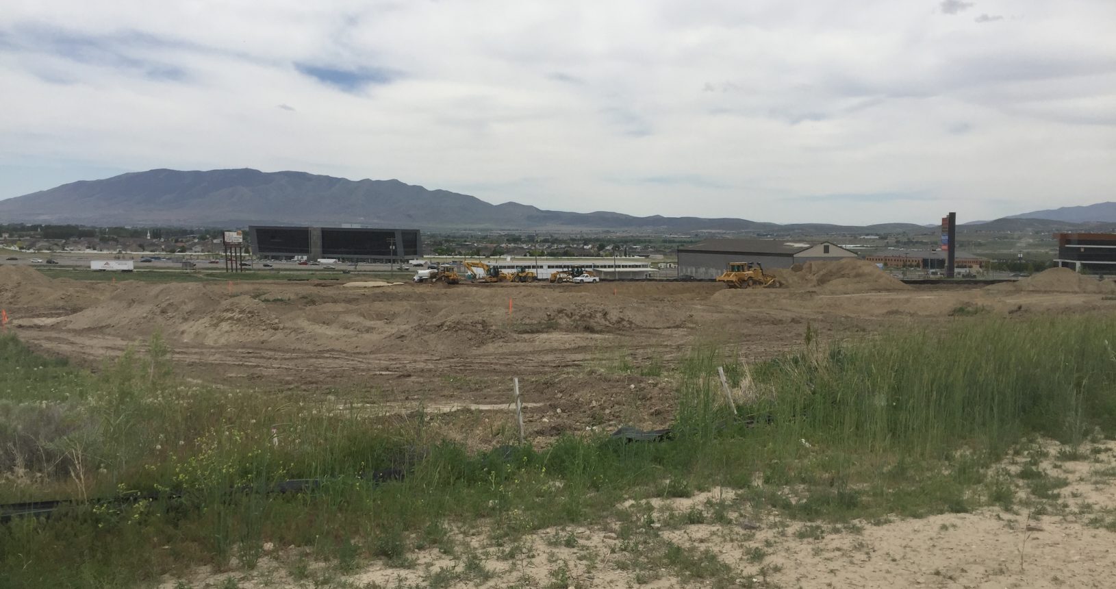 A view of an empty lot from the side.