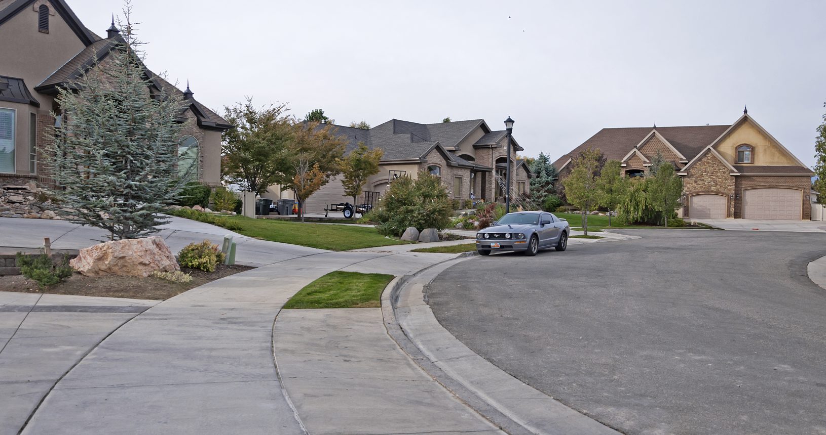 A car is parked on the side of a street.