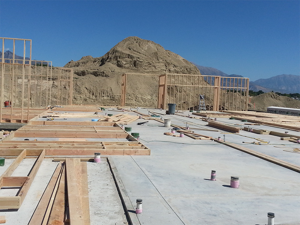 A construction site with many wooden boards on it.