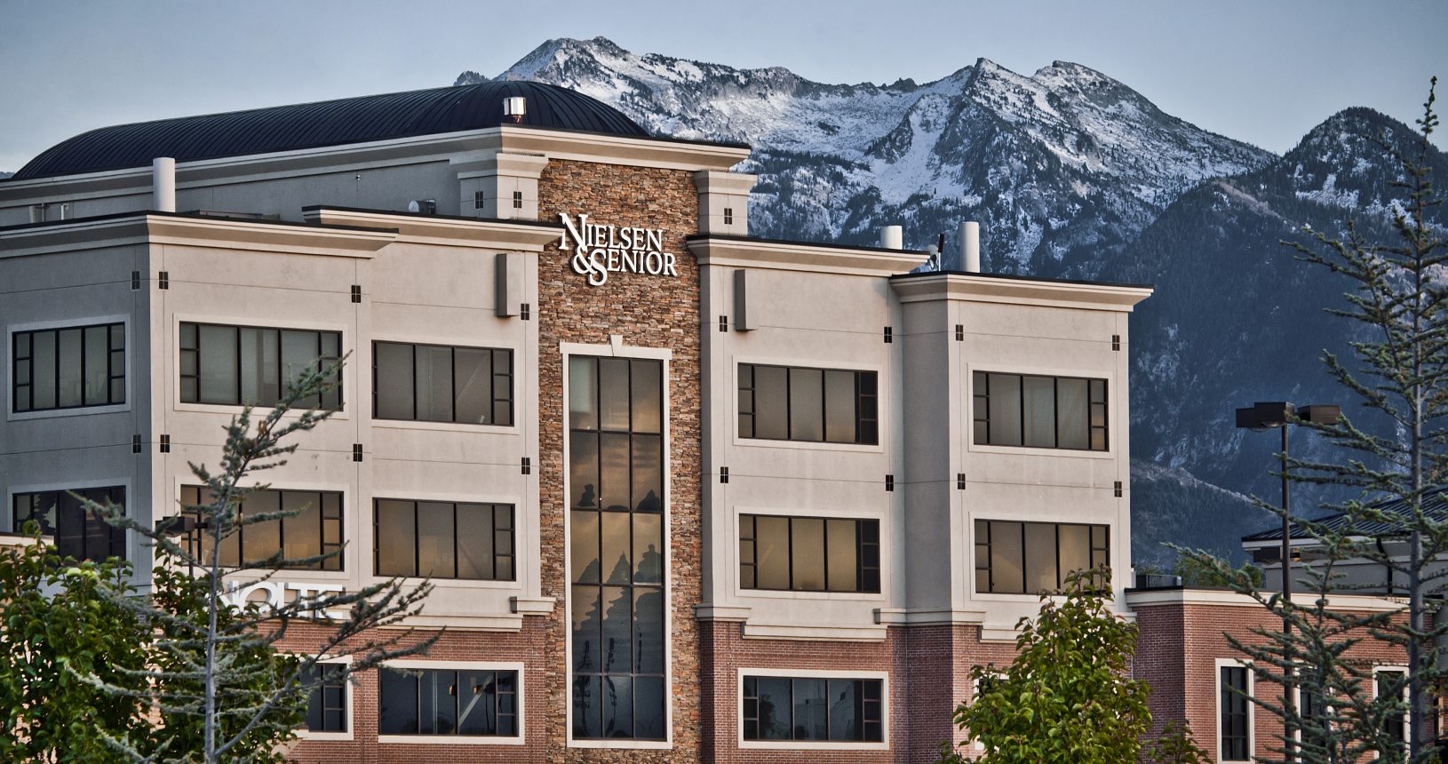 A building with a mountain in the background