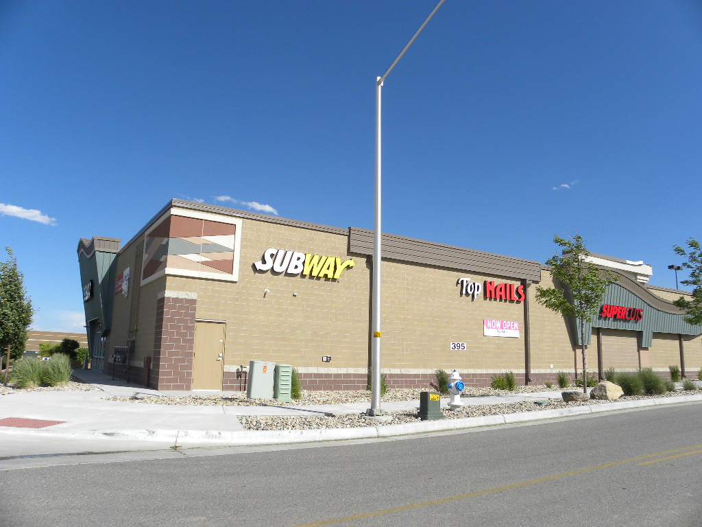 A large building with many signs on it