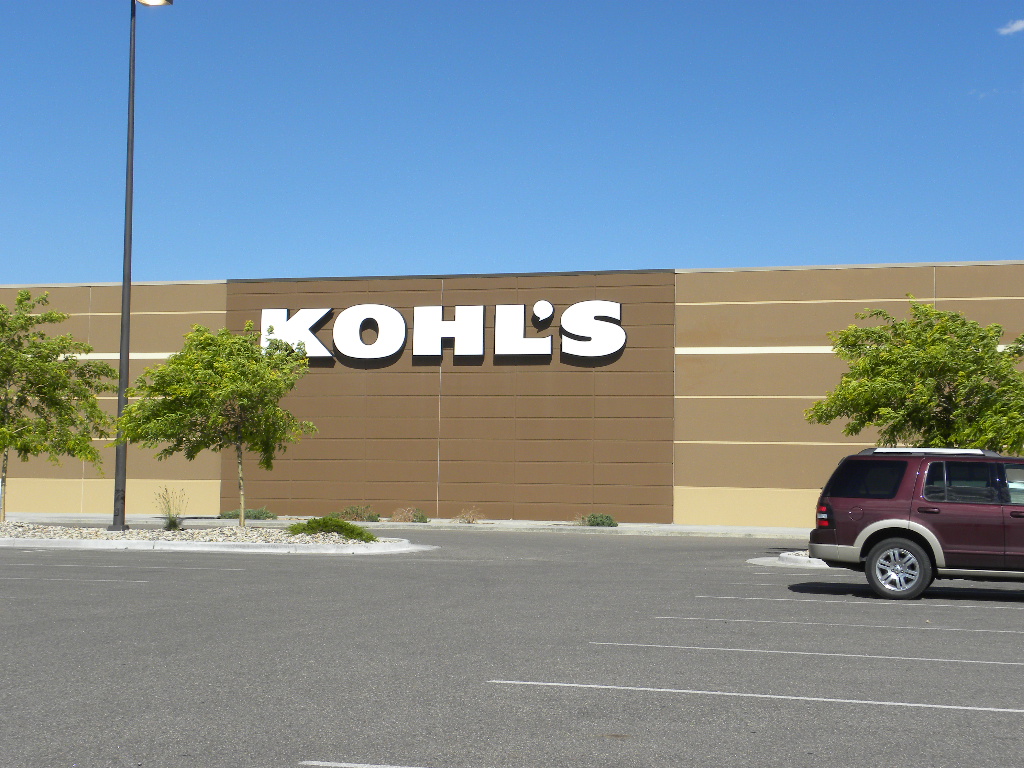 A car parked in front of a kohl 's store.