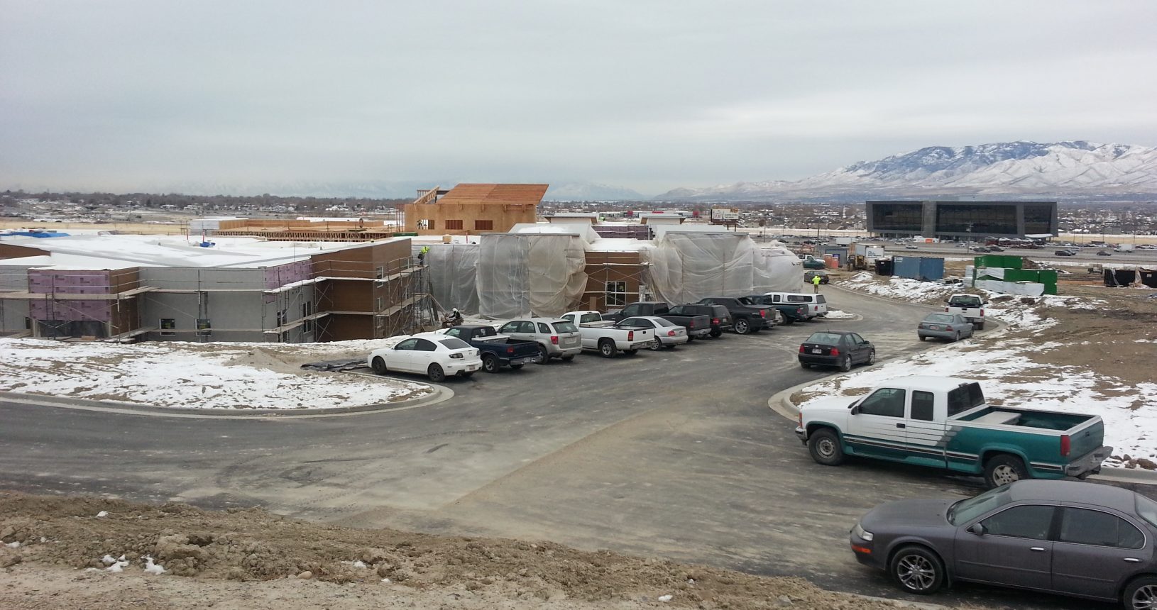 A parking lot with cars parked in it