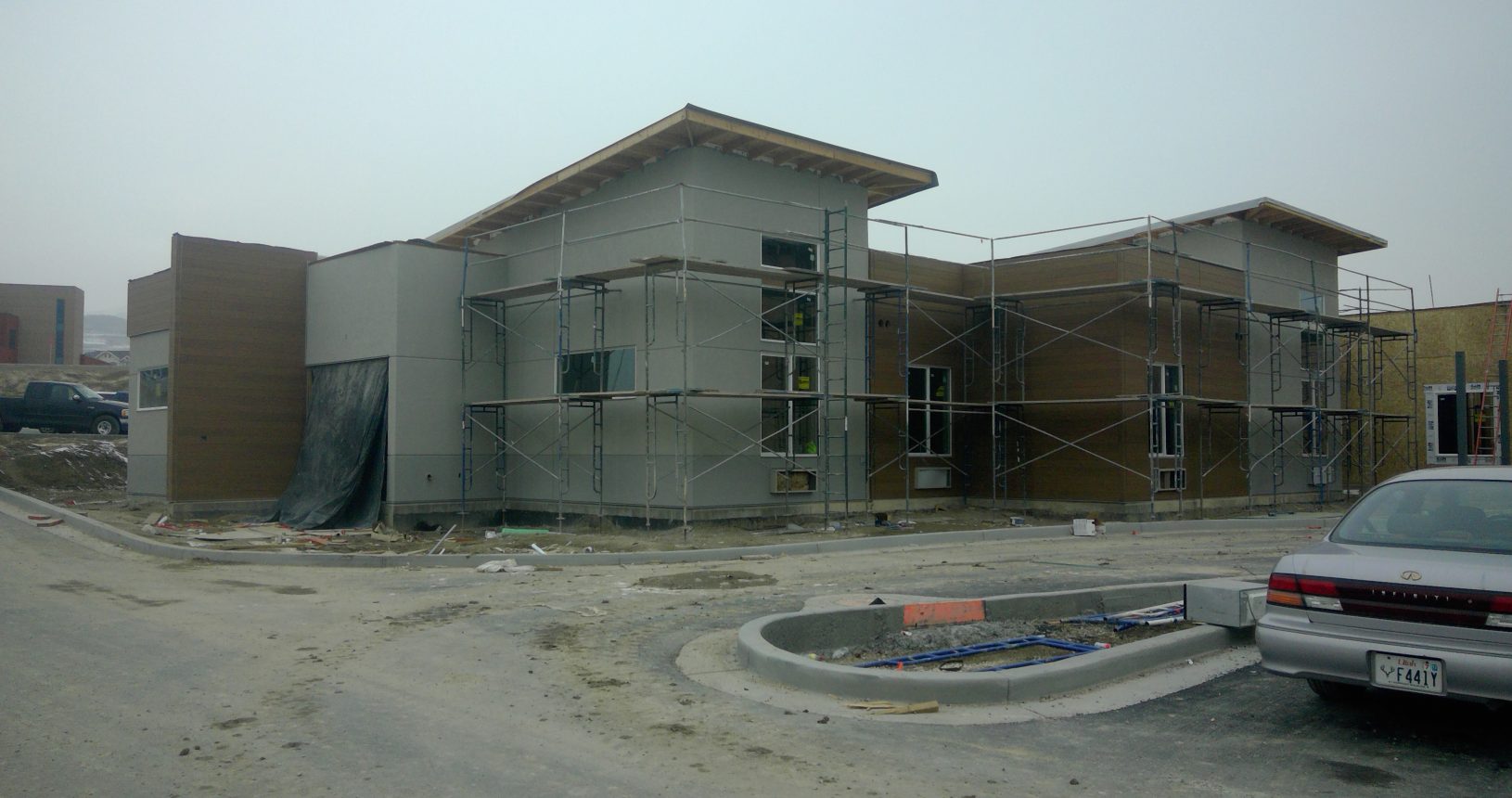 A building under construction with scaffolding around it.