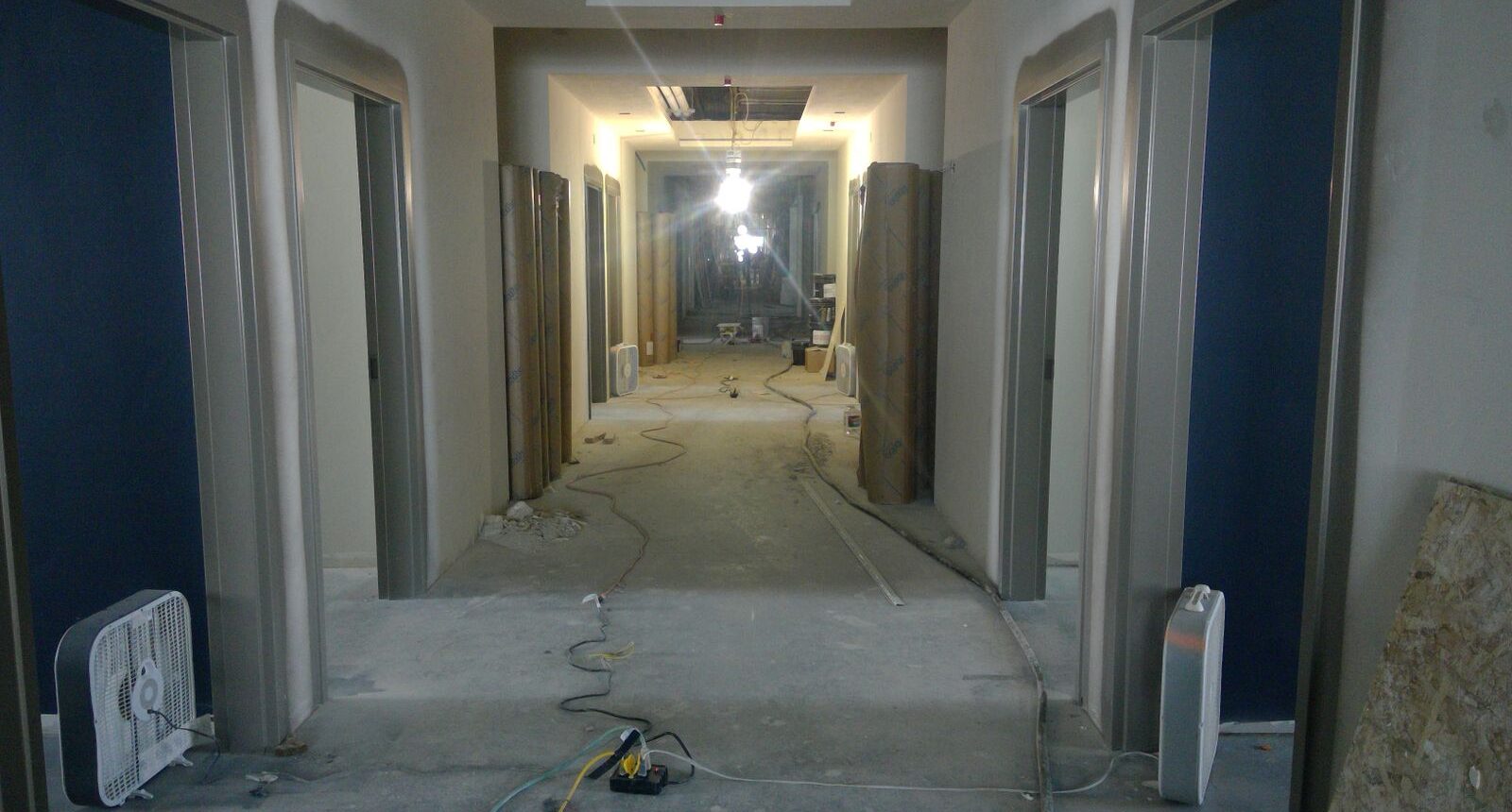 A hallway with a lot of construction equipment on it