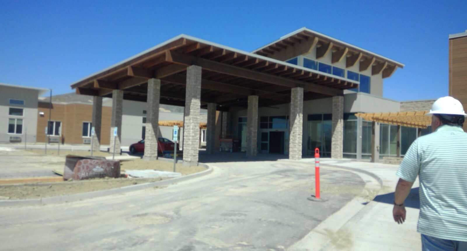 A building with a large open area in front of it.