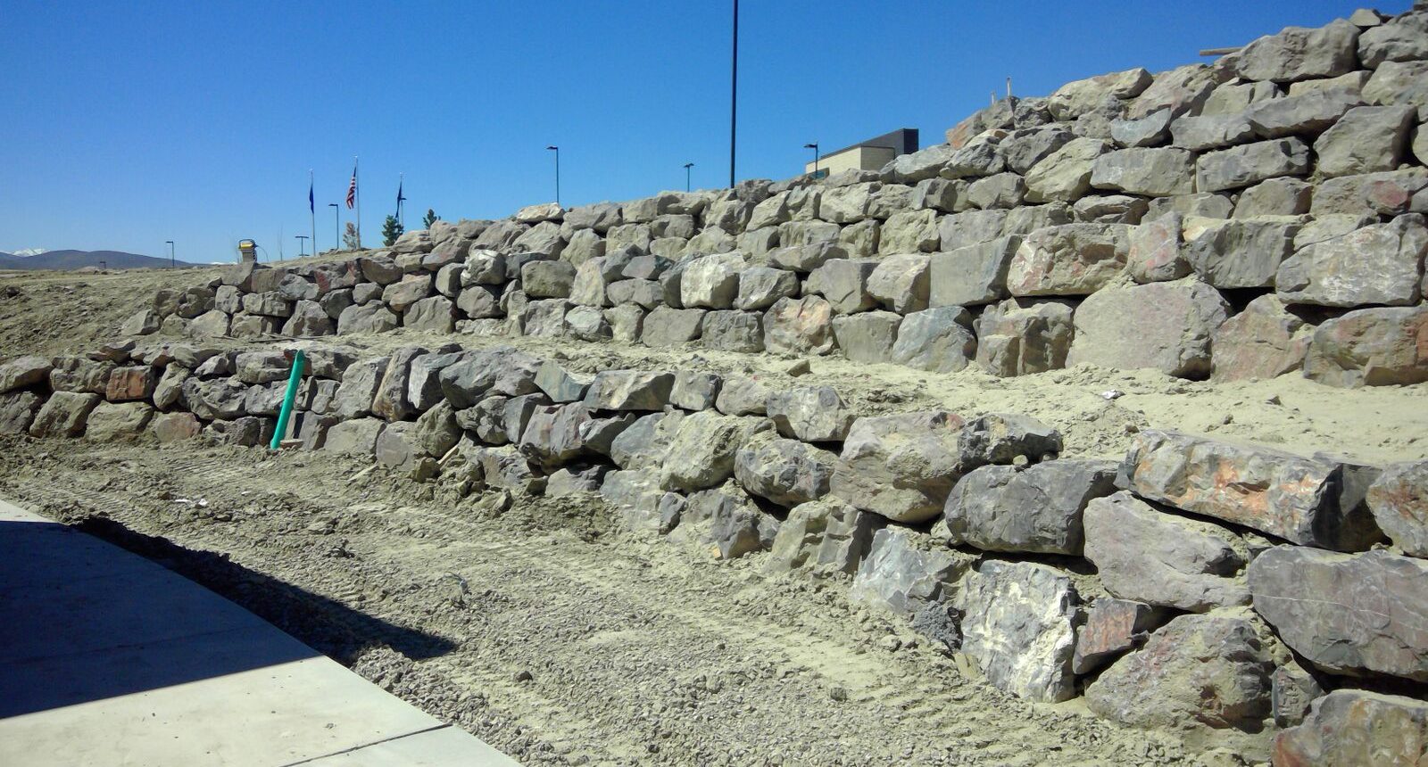 A stone wall with many rocks on it