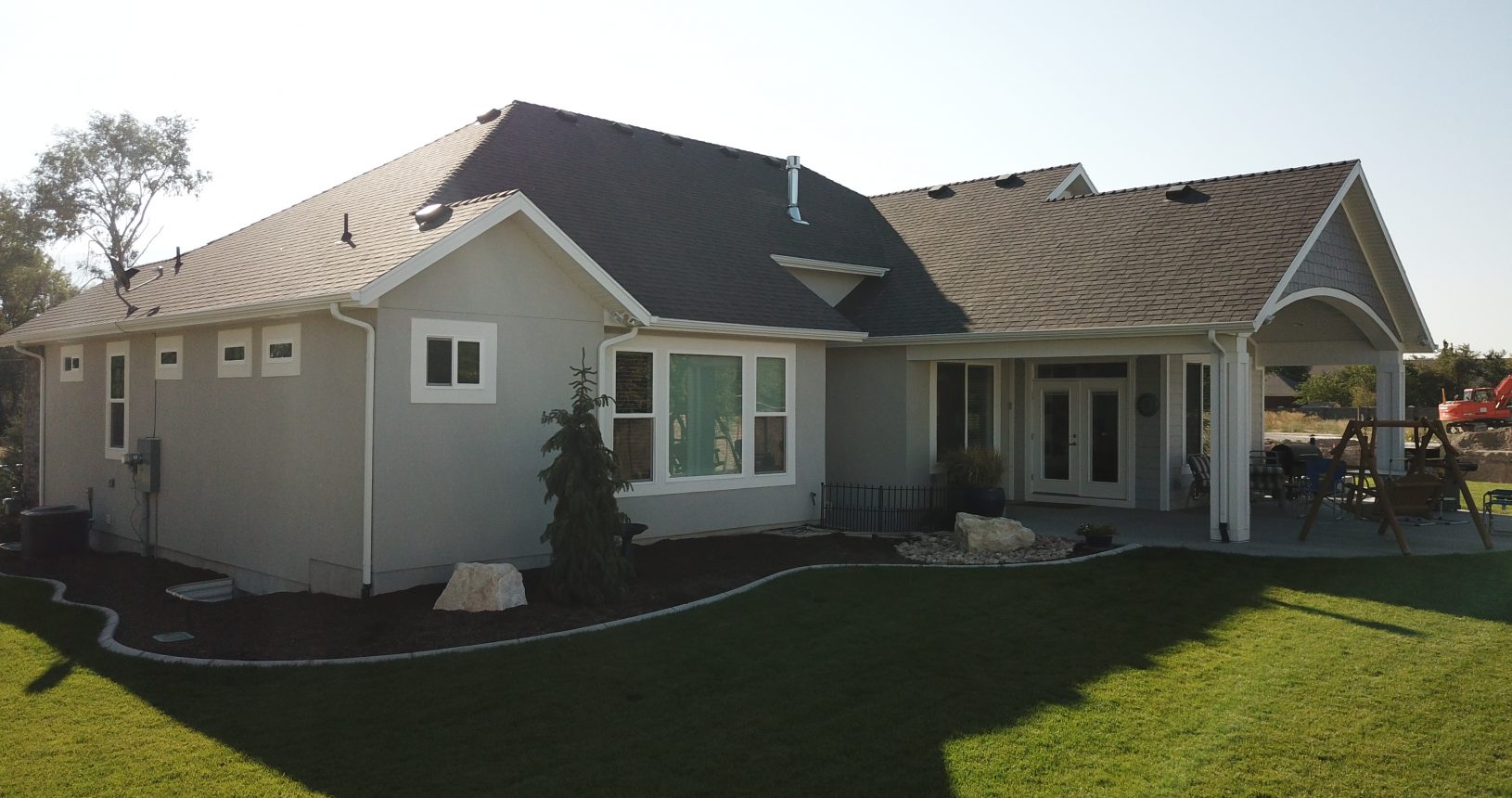 A large house with grass in the yard