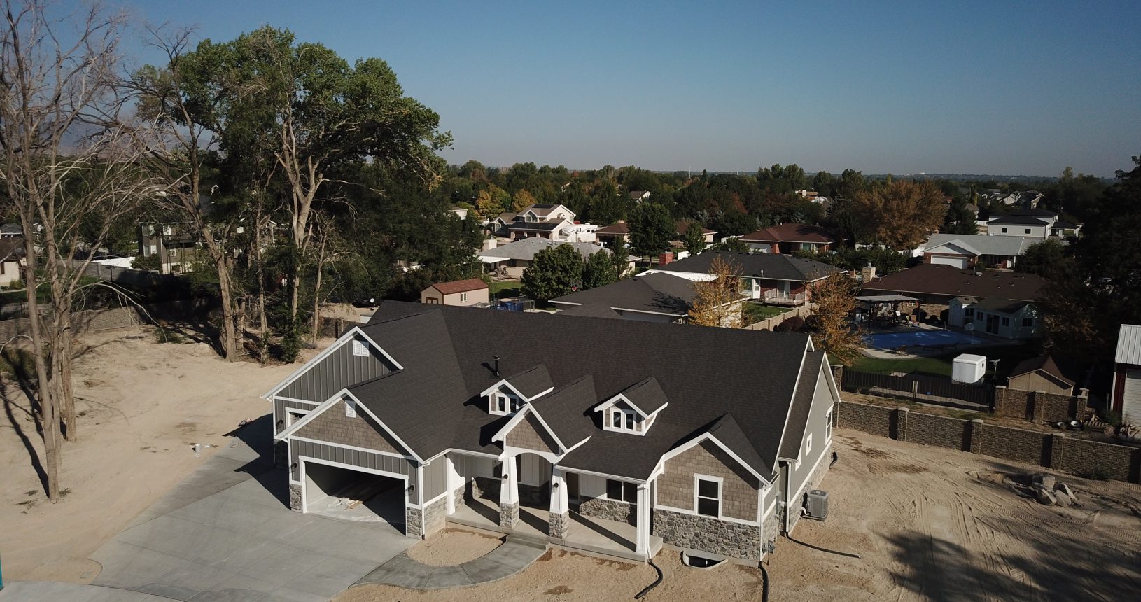 A house with a lot of dirt on the ground